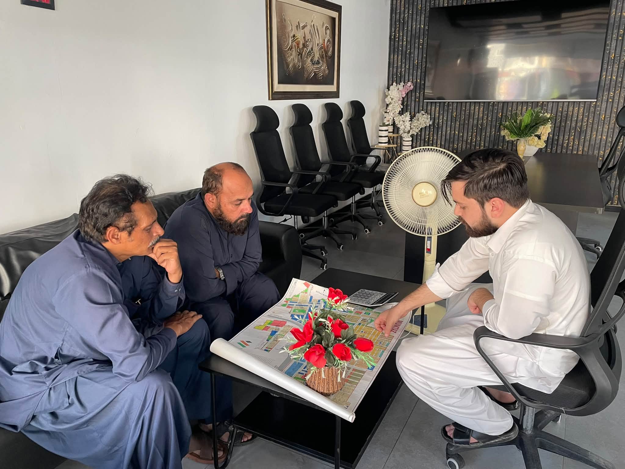 Wahid Marketing Network team meeting with clients in Islamabad